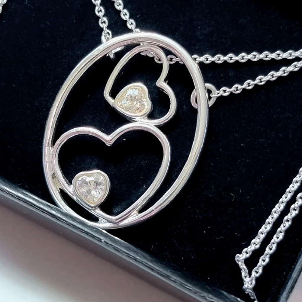 Nesting Hearts Charm Necklaces Avon Silver Tone
